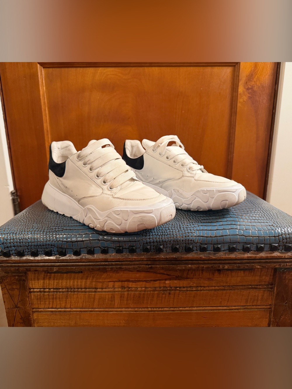 Alexander McQueen Oversized Court Trainer in a white and black colorway.